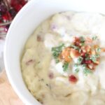 Homemade potato soup in white bowl
