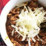 Easy homemade chili recipe topped with cheese