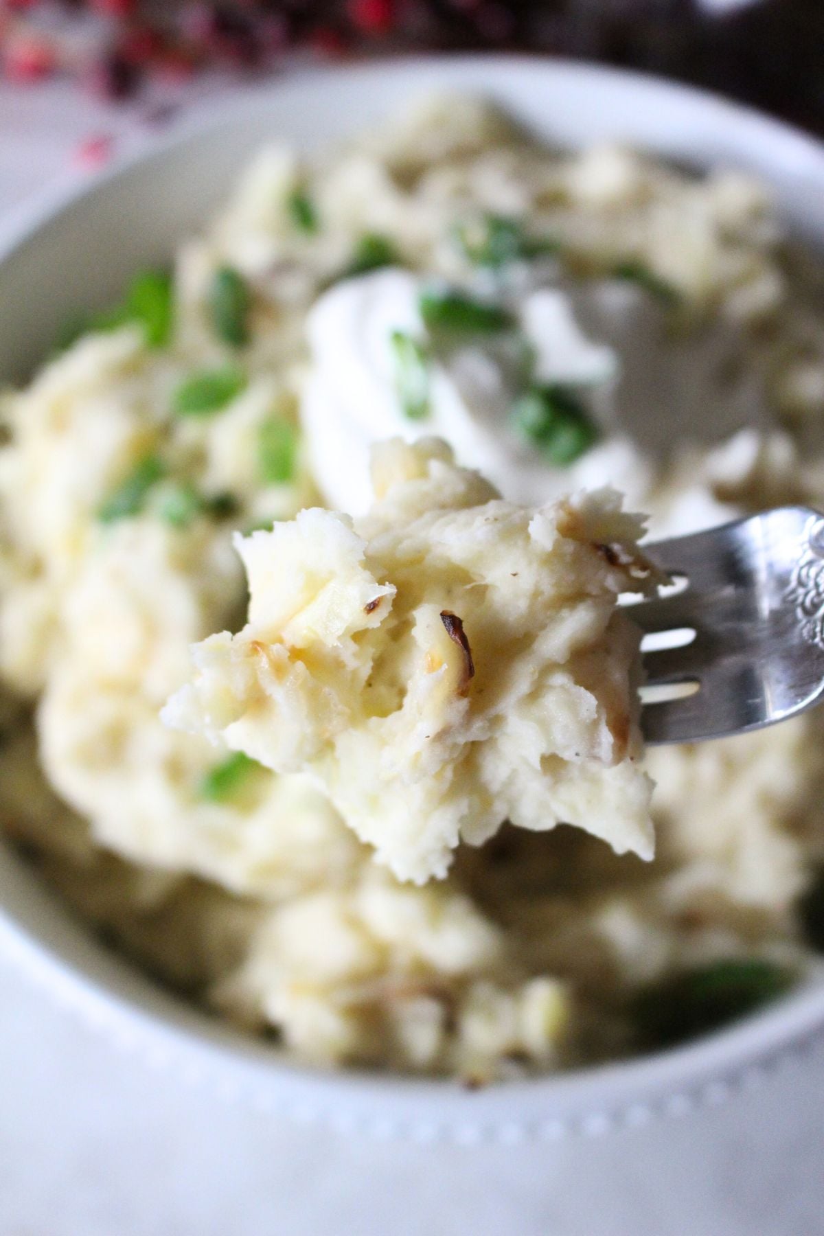 close up of a forkful of finished colcannon potatoes.