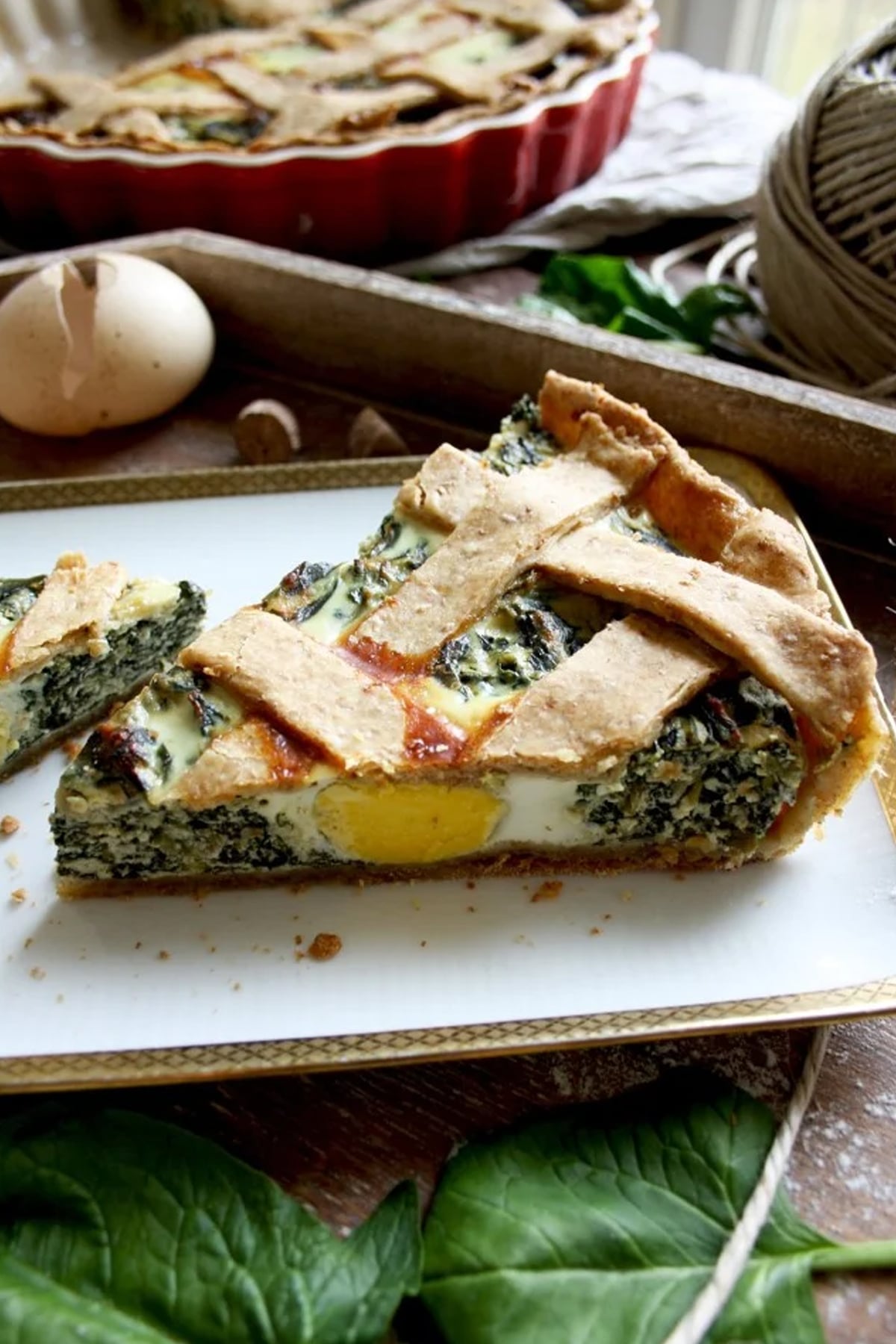 close up of a slice of Rustic Ricotta Spinach Quiche