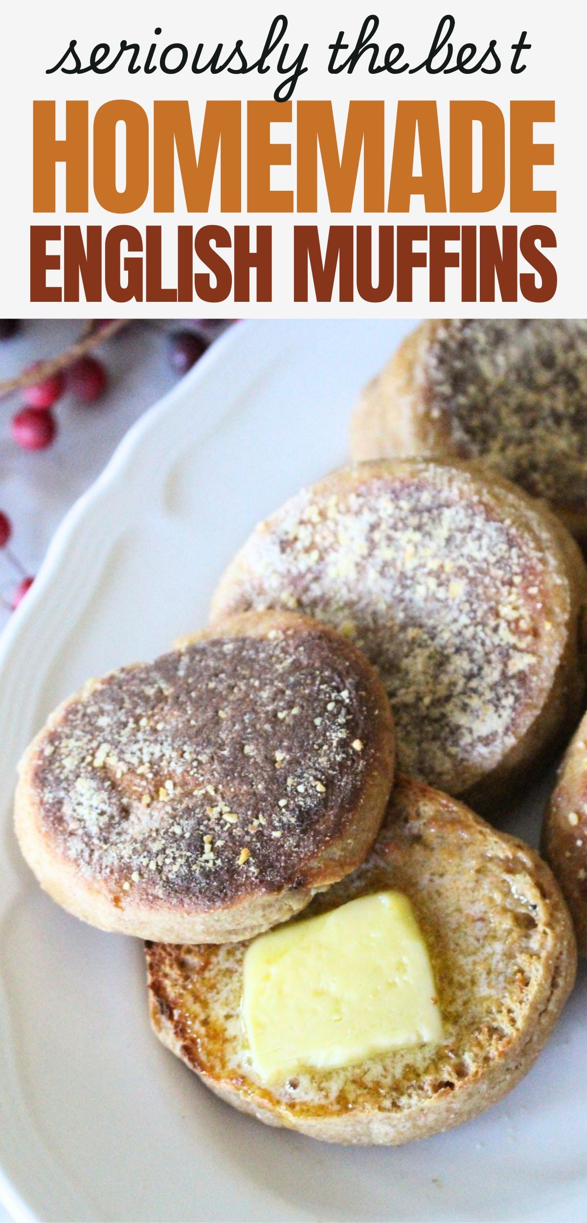 Finished homemade english muffins on a plate, one is cut open and toasted with melting butter on the middle. A text overlay reads seriously the best homemade english muffins