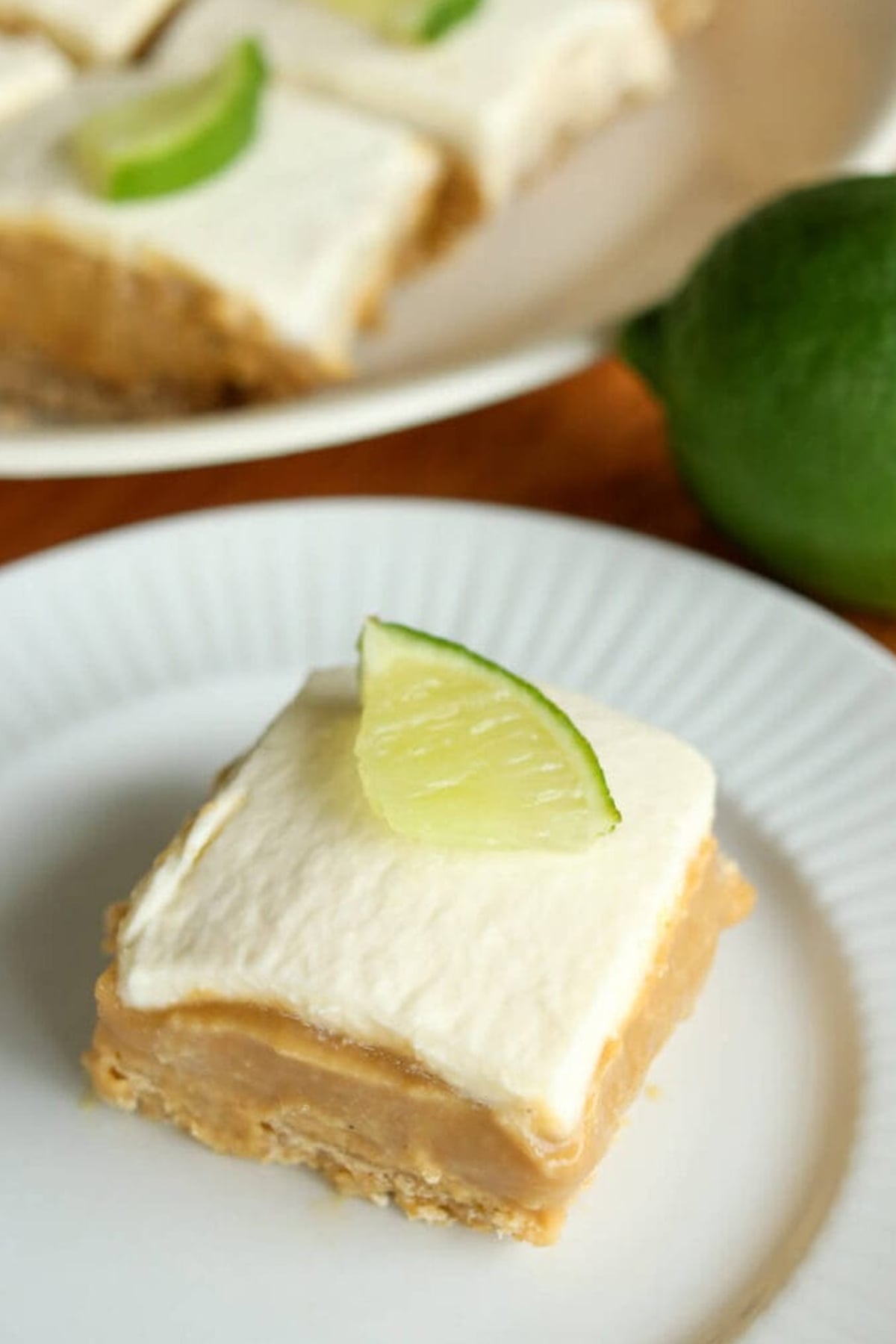 a homemade lime bar on a white plate