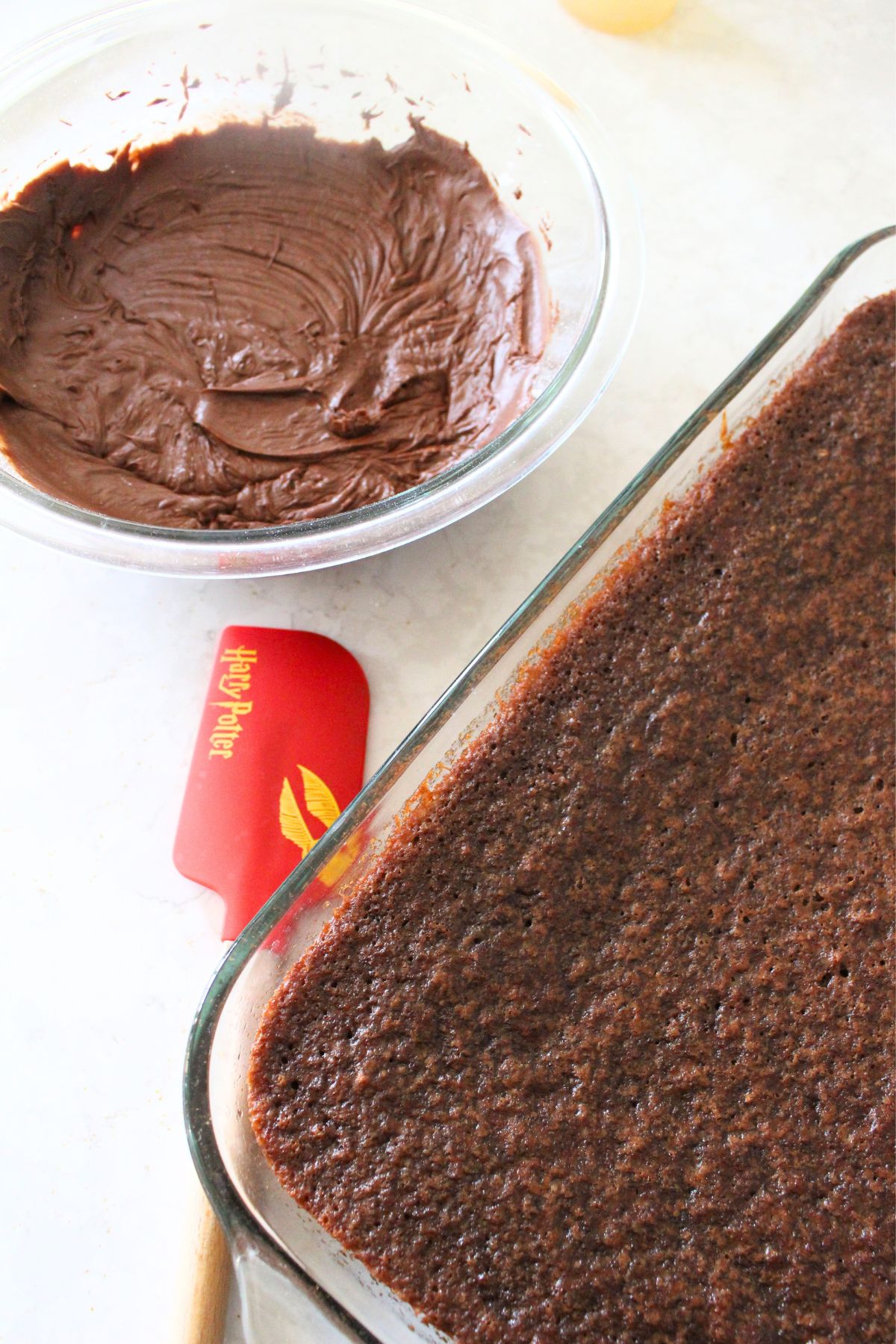 the finished chocolate cake ready to be iced with chocolate frosting