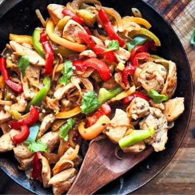 Skillet full of chicken fajitas finished and ready to serve.