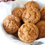 Finished pumpkin muffins in a white serving bowl