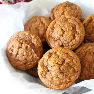 Finished pumpkin muffins in a white serving bowl